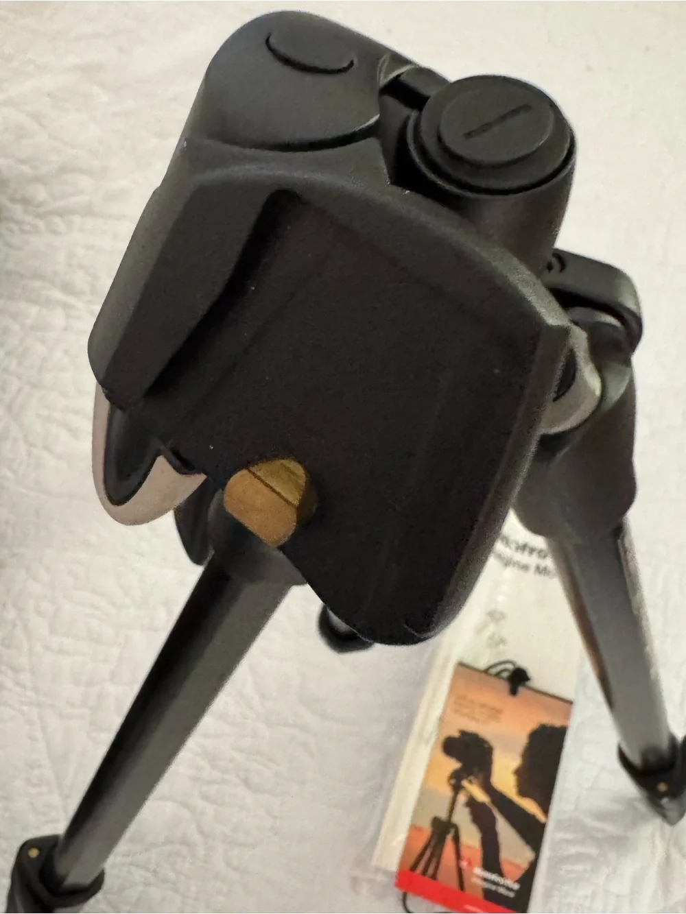 Manfrotto 390 camera tripod, model MK393-HM.